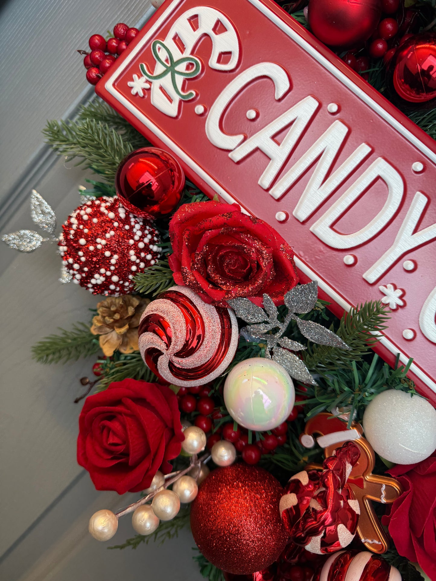 Candy Cane Lane Christmas Artificial Wreath – Gingerbread & Candy Theme Door Decor – Red & White Holiday Wreath with Baubles, Berries, Roses & Sign