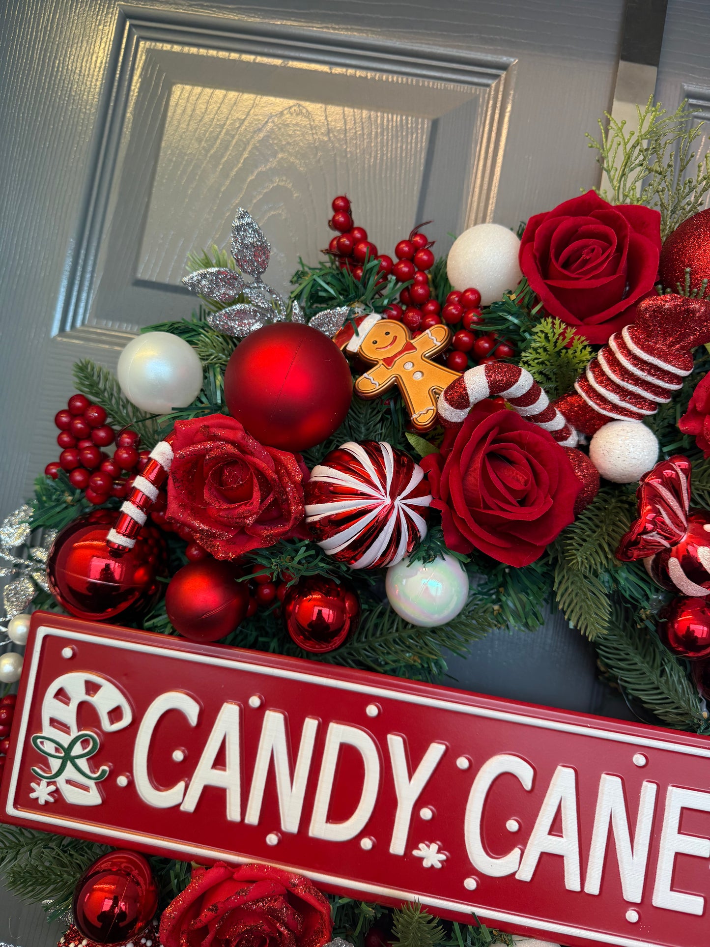 Candy Cane Lane Christmas Artificial Wreath – Gingerbread & Candy Theme Door Decor – Red & White Holiday Wreath with Baubles, Berries, Roses & Sign