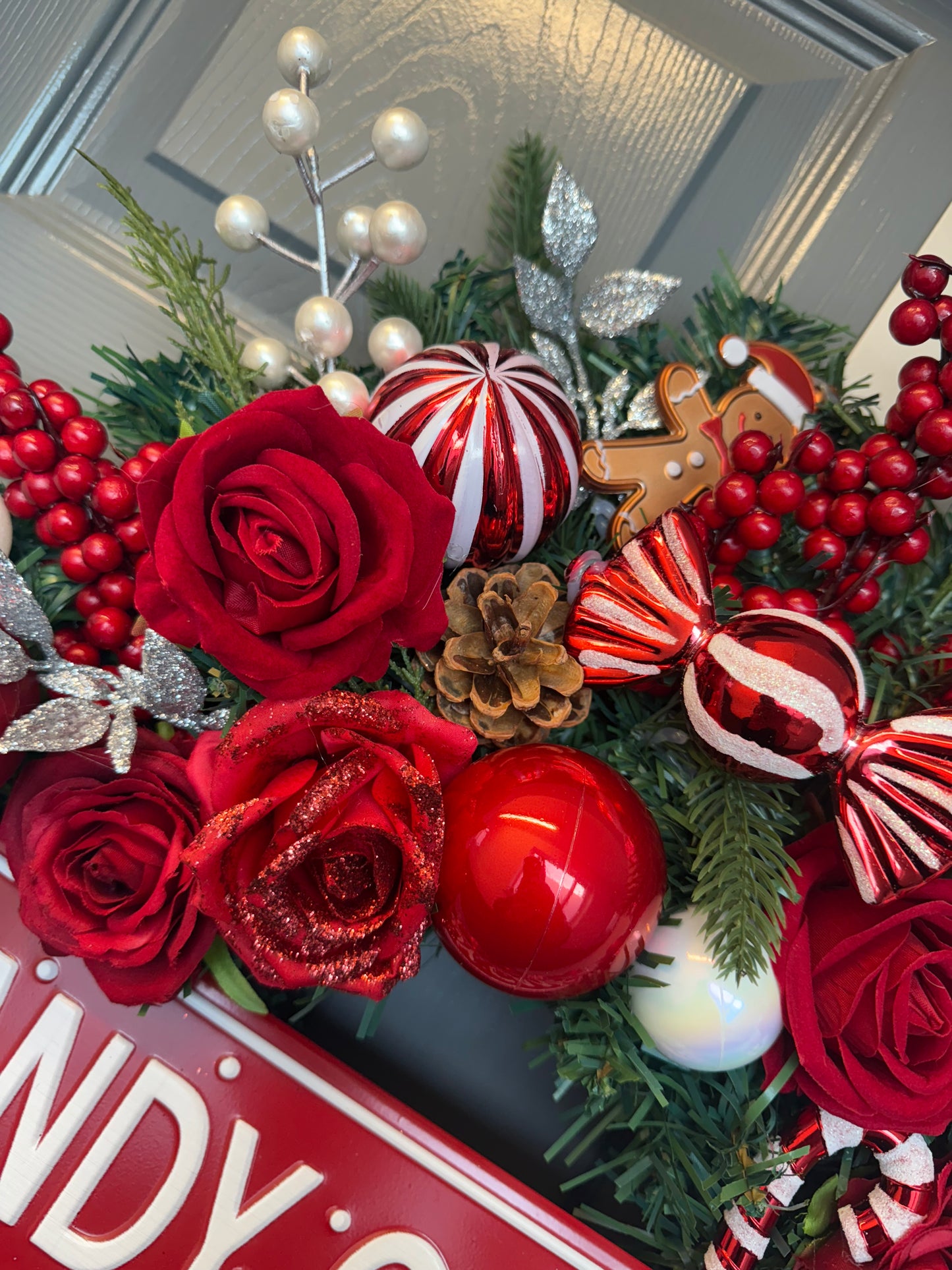 Candy Cane Lane Christmas Artificial Wreath – Gingerbread & Candy Theme Door Decor – Red & White Holiday Wreath with Baubles, Berries, Roses & Sign