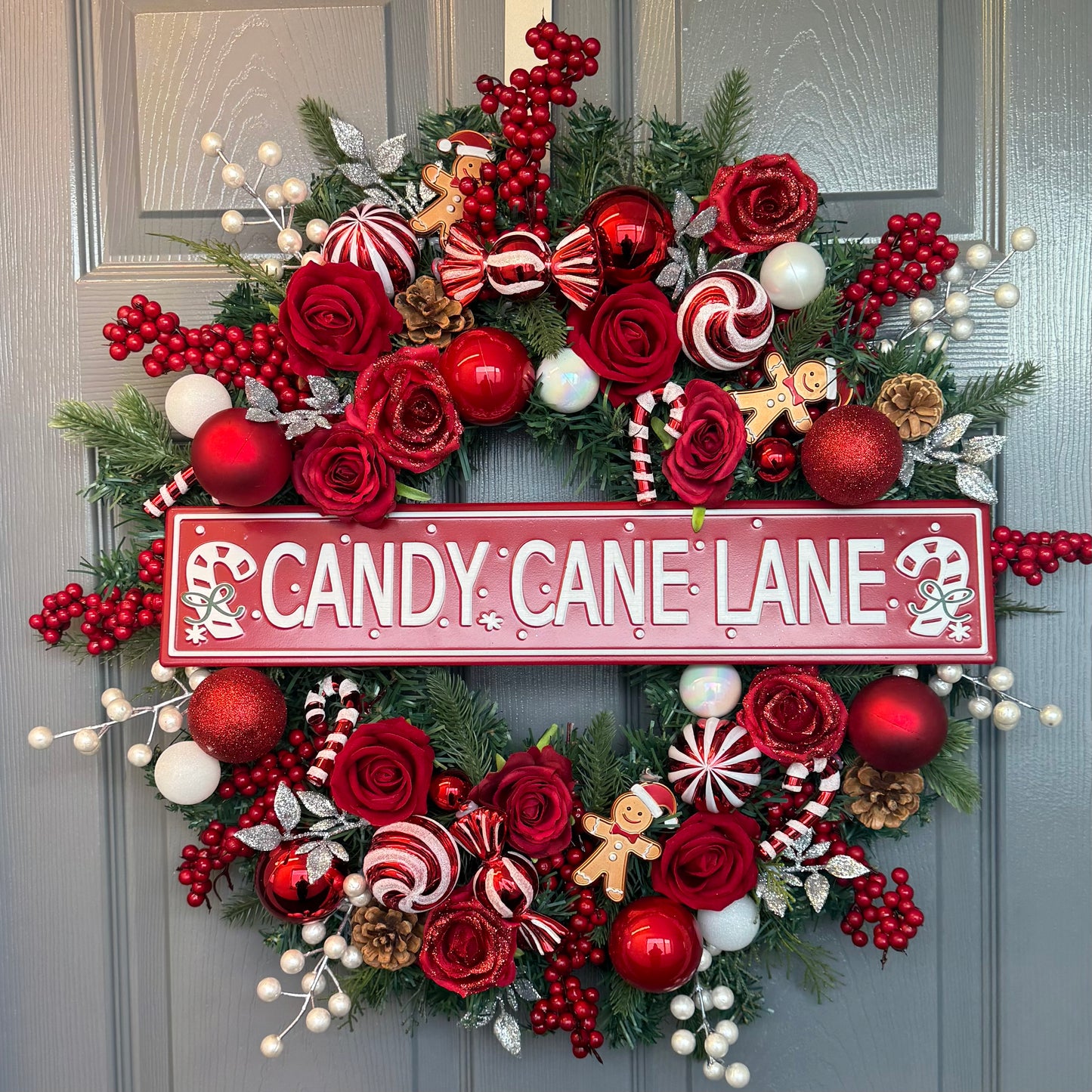 Candy Cane Lane Christmas Artificial Wreath – Gingerbread & Candy Theme Door Decor – Red & White Holiday Wreath with Baubles, Berries, Roses & Sign