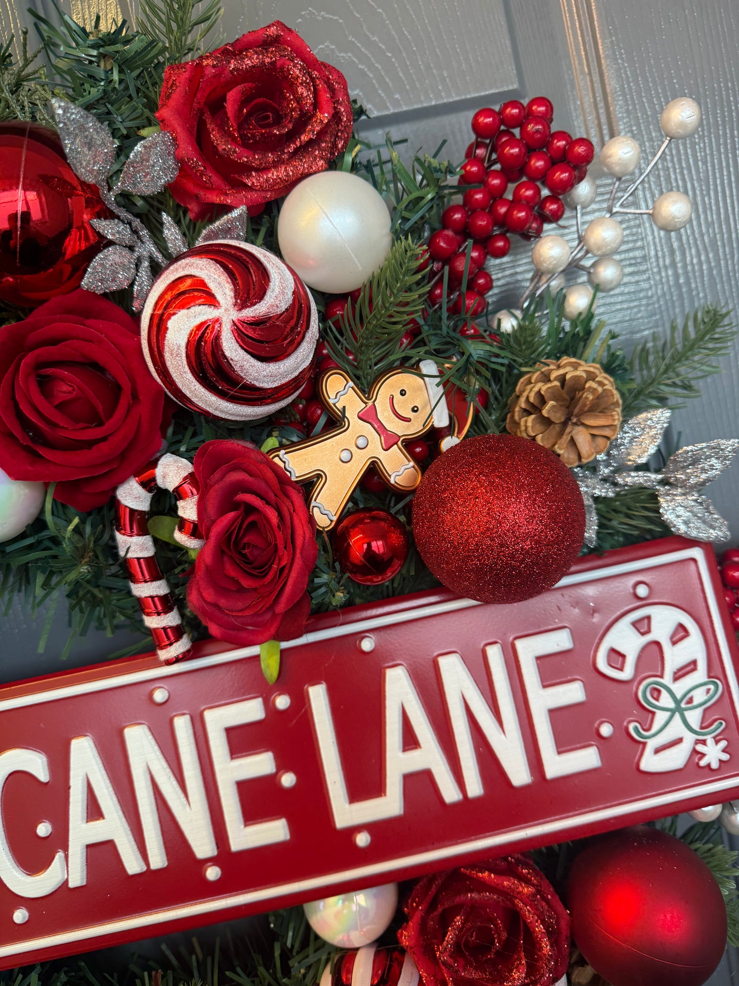 Candy Cane Lane Christmas Artificial Wreath – Gingerbread & Candy Theme Door Decor – Red & White Holiday Wreath with Baubles, Berries, Roses & Sign