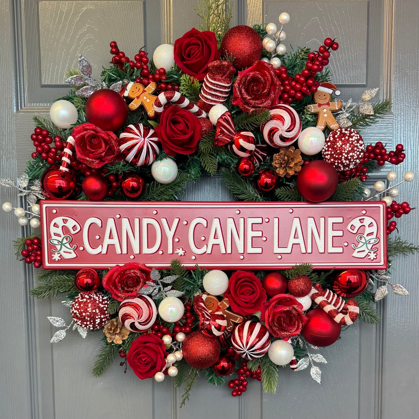 Candy Cane Lane Christmas Artificial Wreath – Gingerbread & Candy Theme Door Decor – Red & White Holiday Wreath with Baubles, Berries, Roses & Sign