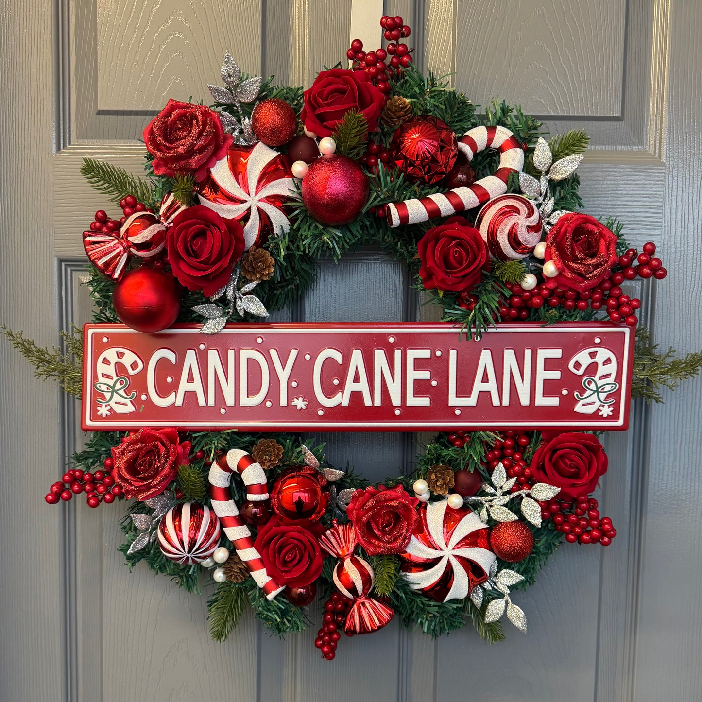 Candy Cane Lane Christmas Artificial Wreath – Gingerbread & Candy Theme Door Decor – Red & White Holiday Wreath with Baubles, Berries, Roses & Sign